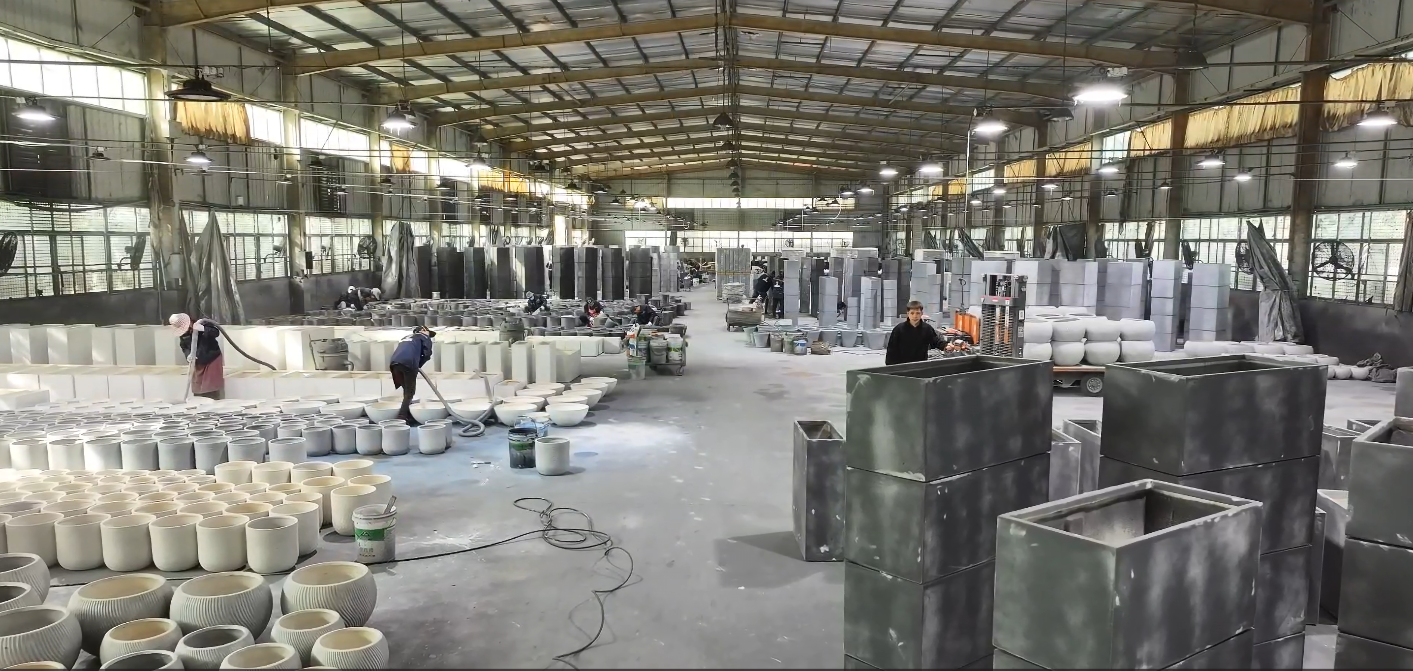 Spray painting and packing workshop for planter pots