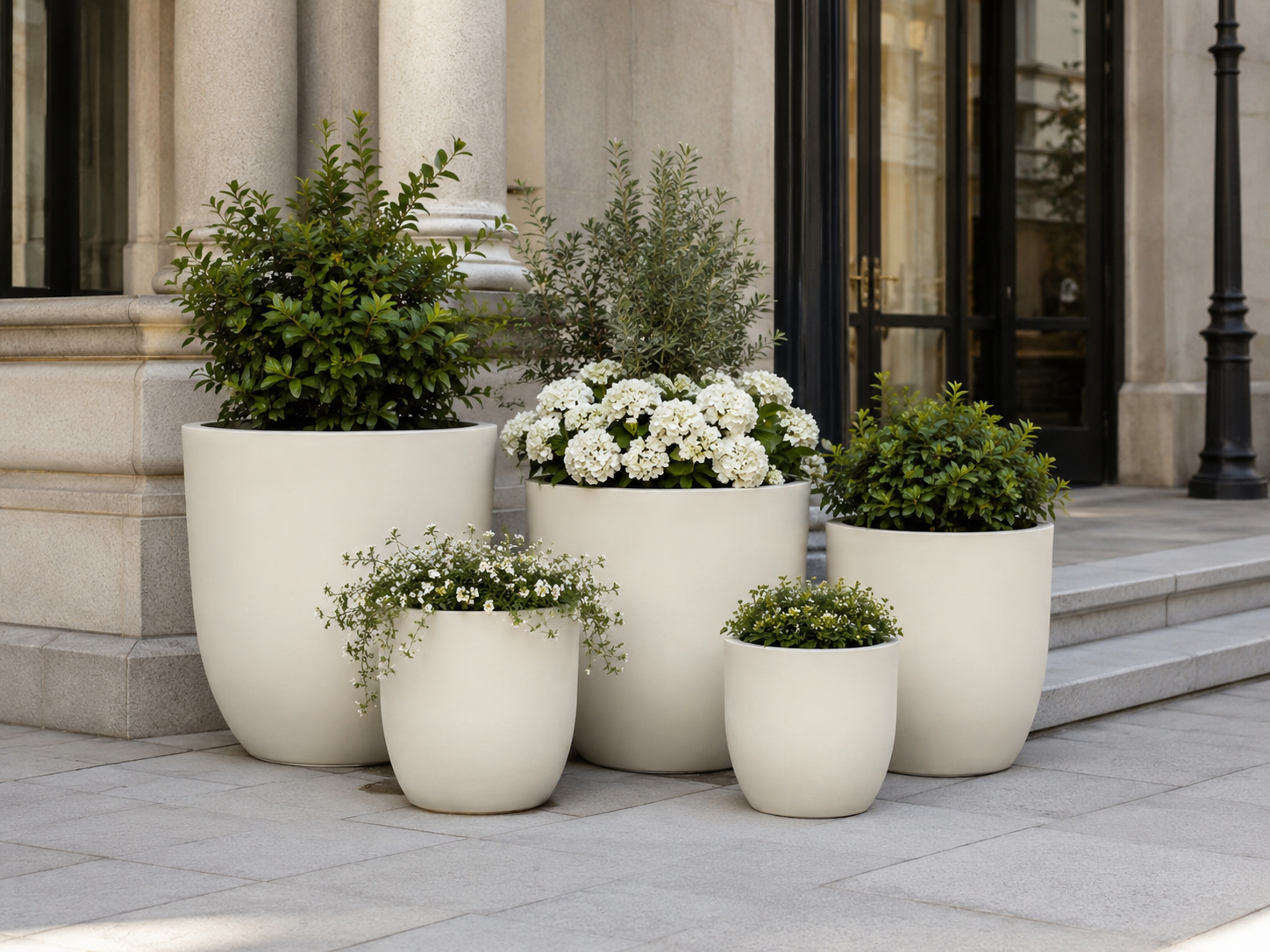 Round Fiber Clay Planter Pots, Set of 5, Matte Black Finish, Lightweight Outdoor Garden Planters for Patio and Landscape Decoration outdoor application view 1