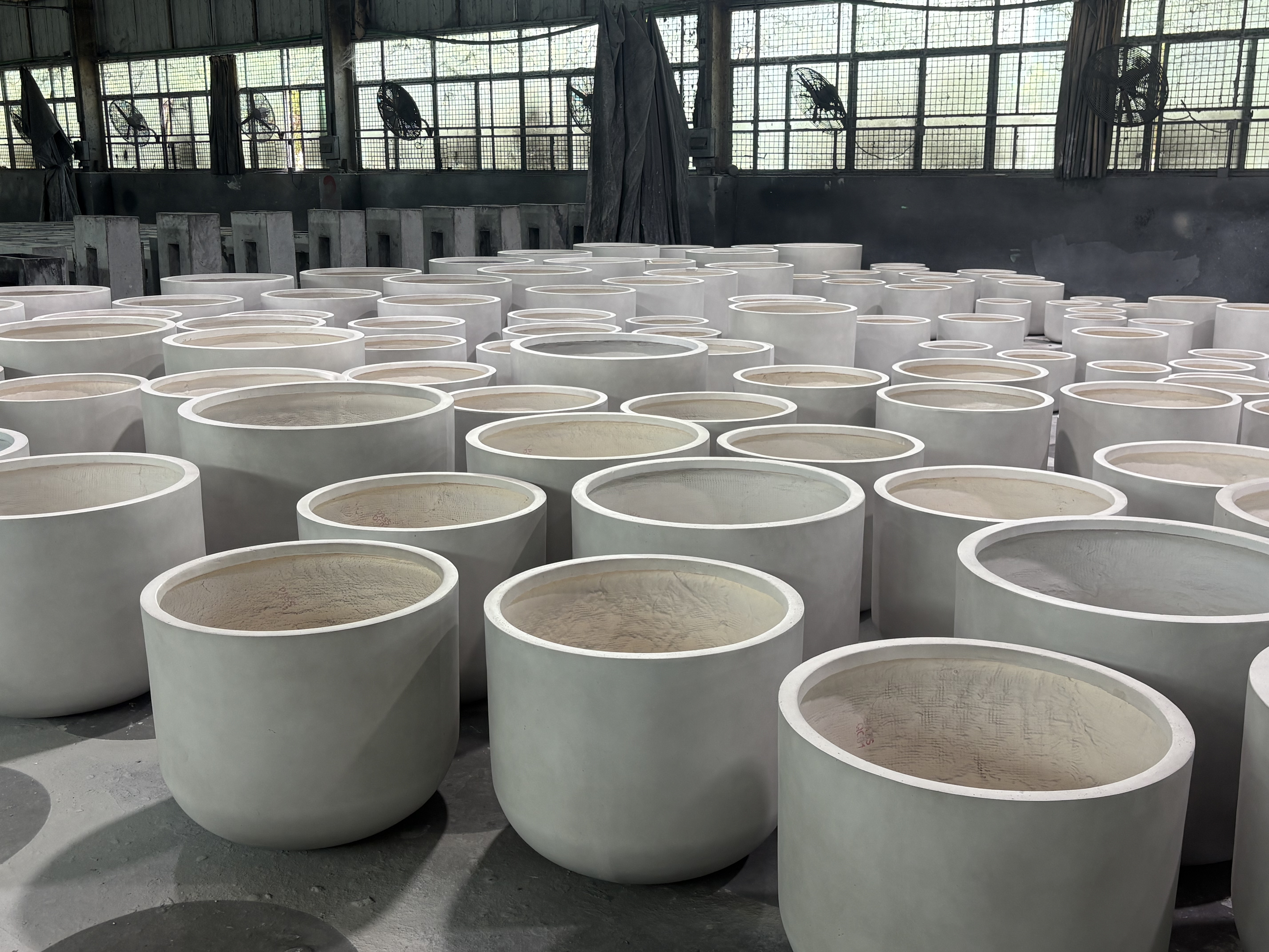 Outdoor planter spray painting process