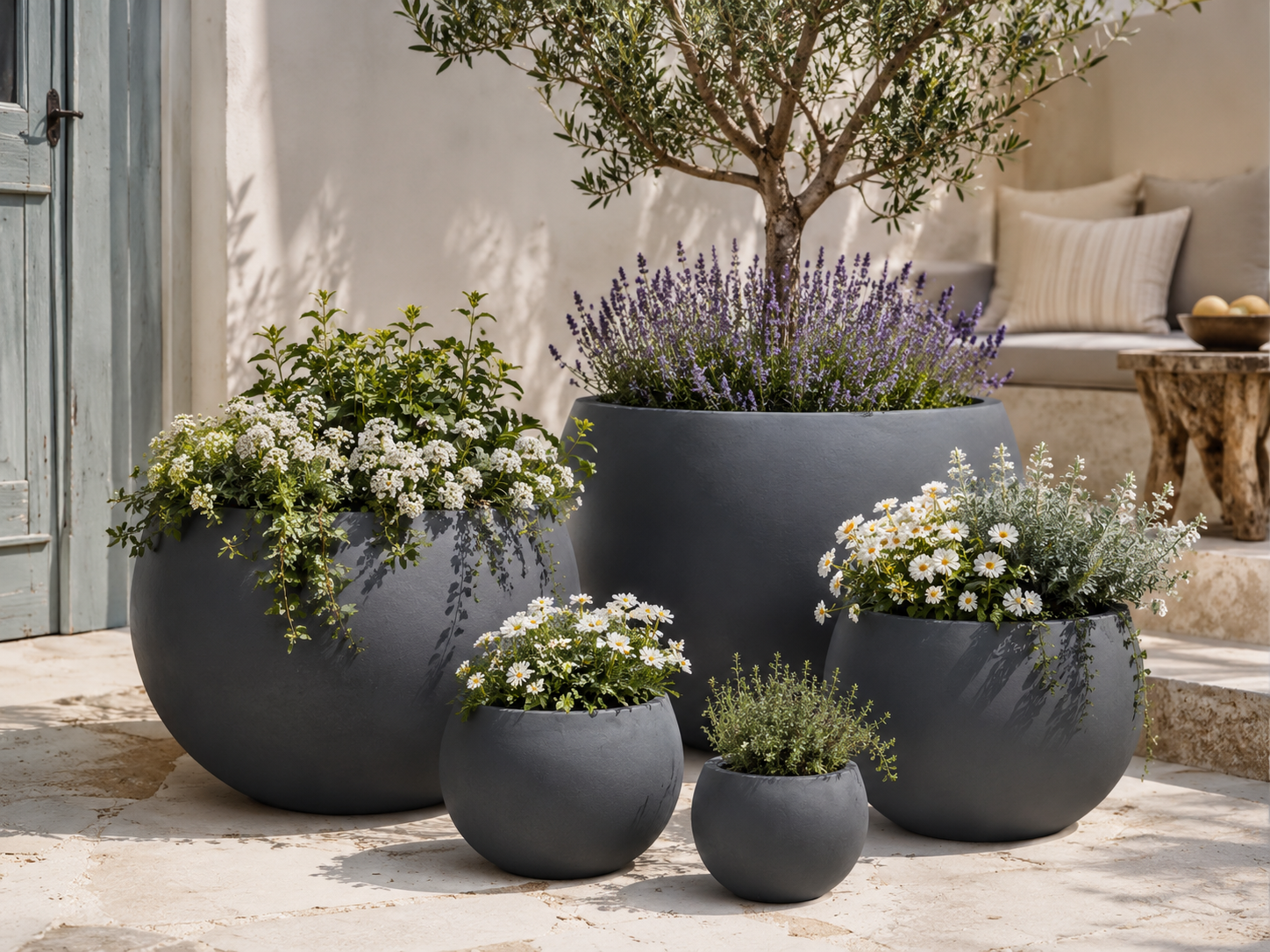 Outdoor fiberclay planter pots beside swimming pool patio