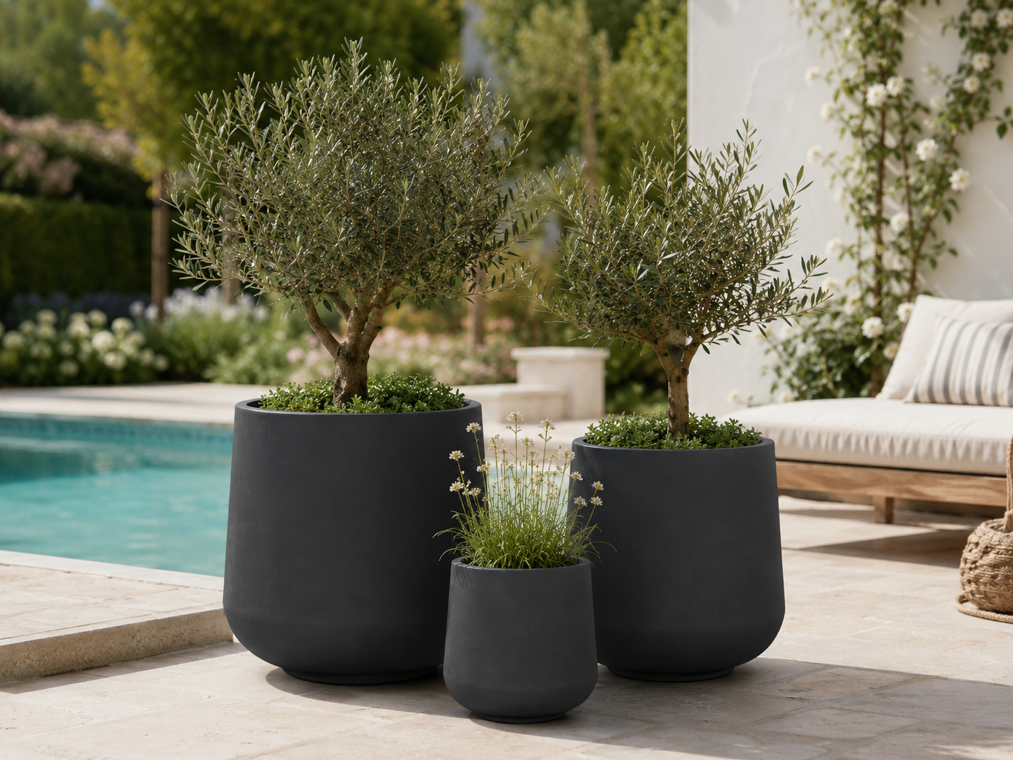 Matte black fibre clay planter set for poolside terrace
