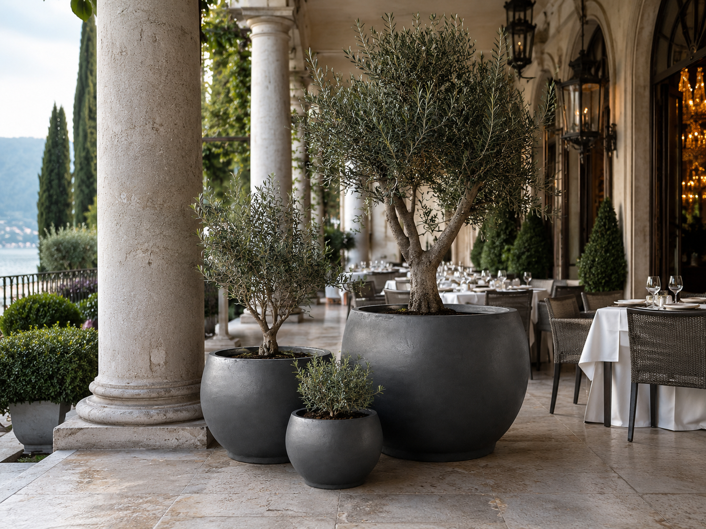 Smooth black outdoor fiberstone planter pots for restaurant corridor